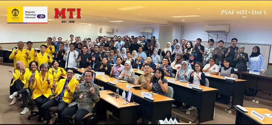 A full classroom posing for a group photo on the first day of the MTI program at Universitas Indonesia