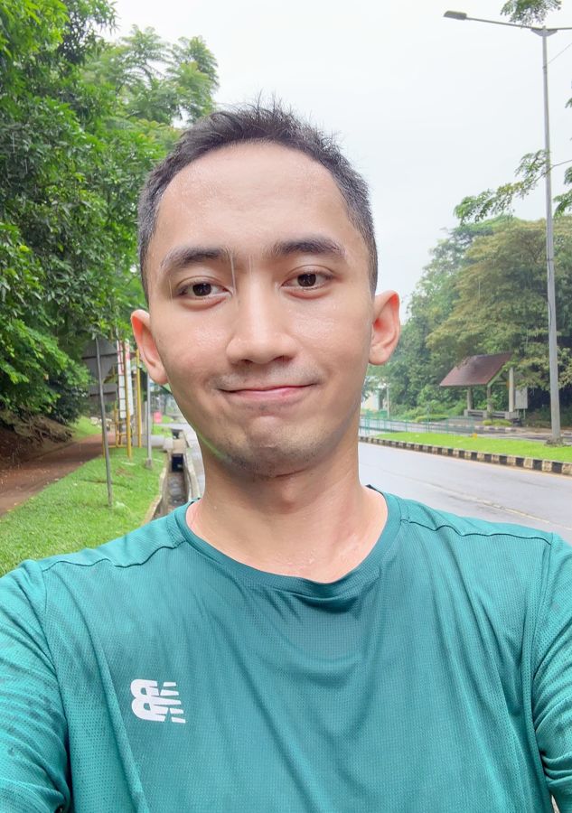 Adryan in sportswear outdoors